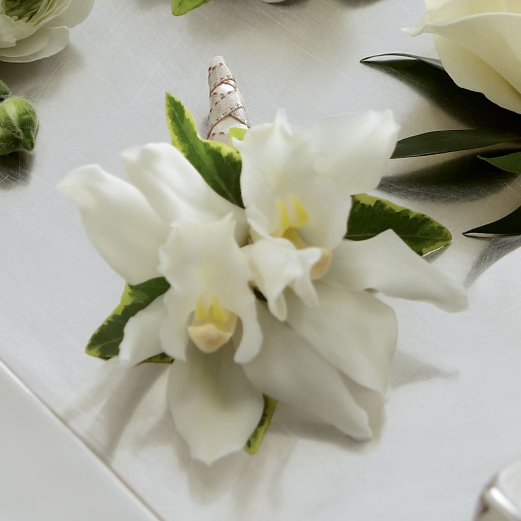 White Mini Cymbidium Boutonniere – Dejavu Florist And Balloons, Durham NC