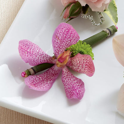 Pink Mokara Boutonniere –  Dejavu Florist And Balloons, Durham NC